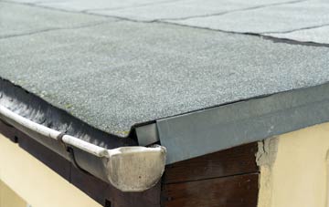 repair or replace Huntington flat roofing?